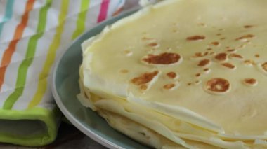 pile of pancakes close-up on a plate