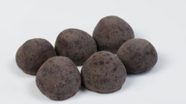 chocolate truffles, close-up, isolated on a white background