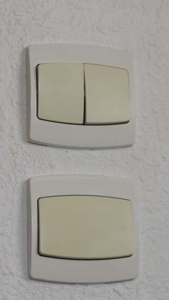 Close Finger Light Switch Home Energy Saving Concept — 图库视频影像