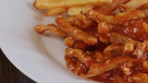 Pieces Pork Cooked Tomato Sauce Fries Close Plate — Stockvideo