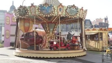 Saint-Quentin - France - 14 February 2023 - view of a children's carousel in the city center of Saint-Quentin