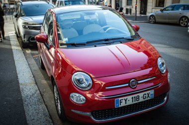Saint-Quentin - France - 14 February 2023 - view of the front of a Fiat 500 brand car parked on a street in downtown Saint-Quentin