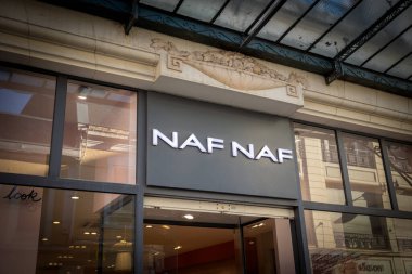 Saint-Quentin - France - 14 February 2023 - storefront of a Naf naf brand clothing store in a pedestrian street in the city center