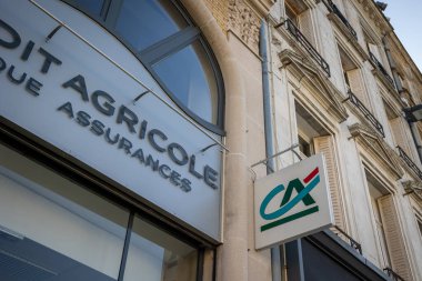 Saint-Quentin - France - 14 February 2023 - facade of a bank branch Crdit Agricole du Nord Est in the city center of Saint-Quentin