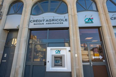 Saint-Quentin - France - 14 February 2023 - facade of a bank branch Crdit Agricole du Nord Est in the city center of Saint-Quentin