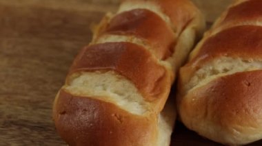 several milk rolls, close-up, on a table