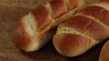 several milk rolls, close-up, on a table