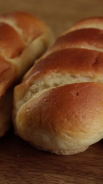 several milk rolls, close-up, on a table
