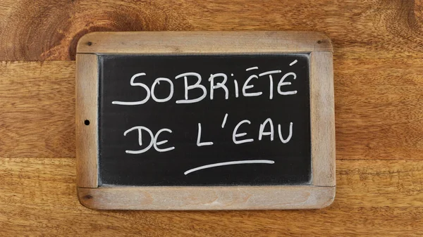 Words Water Sobriety Written French Isolated Slate — Stock Photo, Image