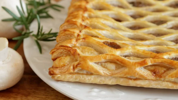 stock image puff pastry with mushrooms, close-up on a plate