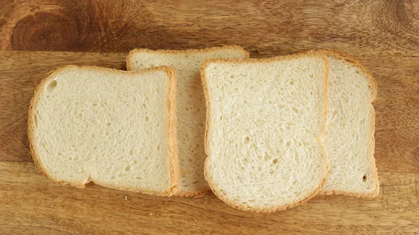 Plasterki Białego Chleba Zbliżenie Stole — Zdjęcie stockowe