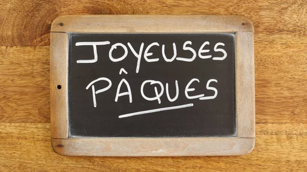 Cuvintele Paşte Fericit Scrise Franceză Ardezie Izolată — Fotografie, imagine de stoc