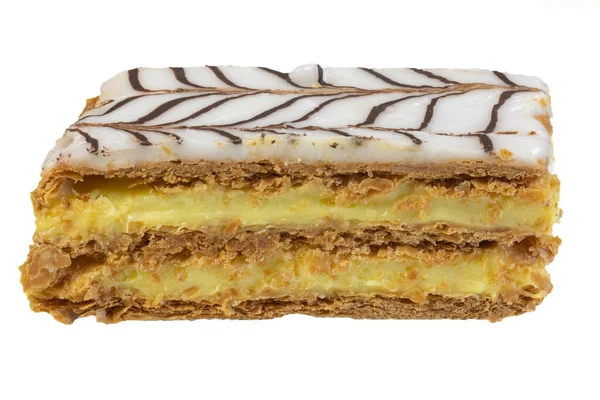 stock image close up view of a millefeuille cake isolated on a white background