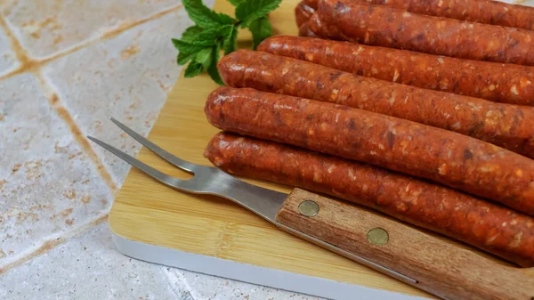 Several Raw Merguez Sausages Close Cutting Board — Stock Photo, Image