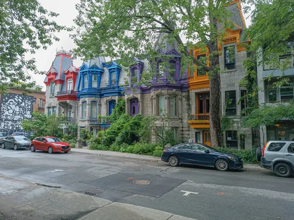 stock image Montreal, Qubec, Canada - 07272023:  Colourful Victorian houses overlooking Place Saint Louis. Montreal, Qubec / Canada.