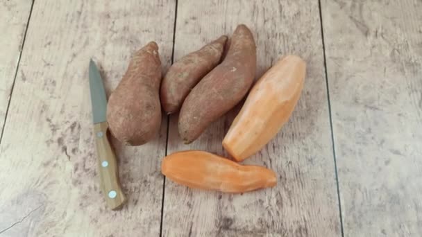 Pile Peeled Raw Sweet Potatoes Cutting Board — Stock Video