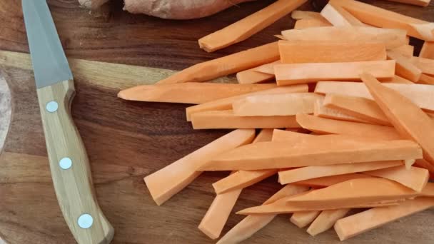 Pile Raw Sweet Potato Fries Cutting Board — Stock Video