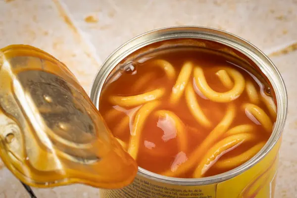 can of spaghetti with tomato sauce, close-up