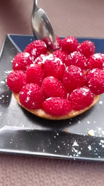 Person Eating Raspberry Tartlet — Stock Video