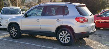 Vaison la Romaine, Vaucluse, France - 02122024 : car, side view of Volkswagen Tiguan brand, stopped in a parking lot clipart