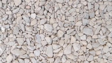 Beyaz çakıl taşlarının arkaplanı, yakın plan