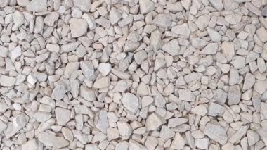 Beyaz çakıl taşlarının arkaplanı, yakın plan