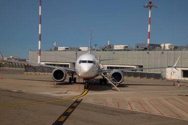 plane on the tarmac of an airport