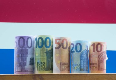 Euro, currency in the EU and flag of european country