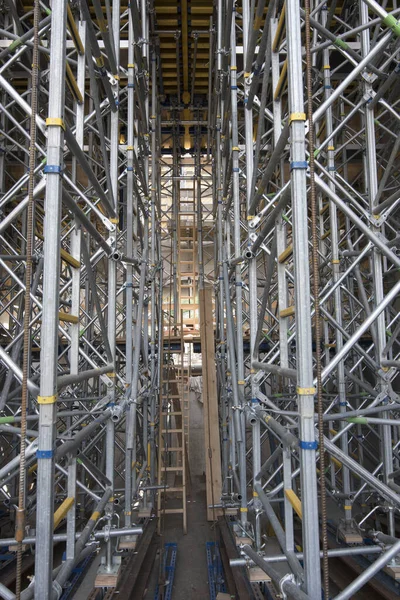 a scaffolding for the construction works on a building or house