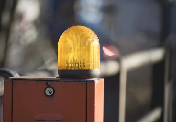orange flashing light for a car, warning signal in road traffic
