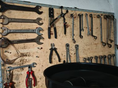 various tools in a workshop or workroom as helpful equipment