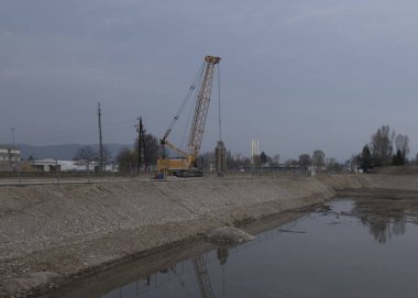 crane vehicle truck in the construction work and road work clipart