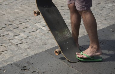 skating on a skateboard popular outdoor sport on the street and in the park clipart