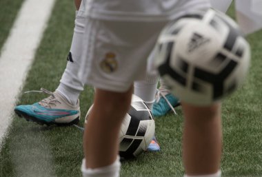 children playing a football game clipart