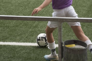 children playing a football game clipart