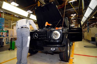 construction of the mercedes G class in graz clipart