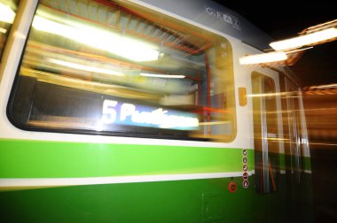 linien graz,streetcar in the city as urban public transport by rail clipart