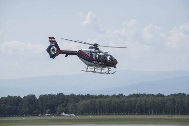 a police helicopter in the air, mobility and transportation in aviation clipart