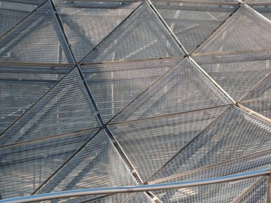 Bir yüzeyde dokuma ve iç içe geçmiş şekiller ve yapılar, desen ve doku