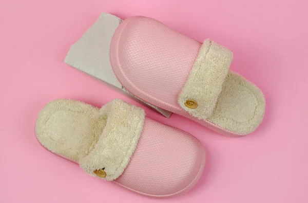 Women\'s pink slippers with fur insulation. Foam indoor shoes.