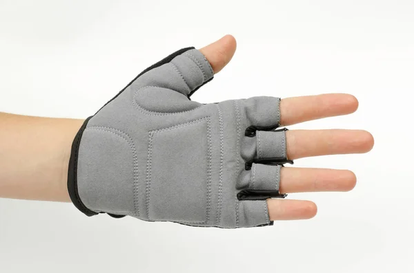 Female hand in a sports glove without fingers. Cycling glove