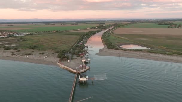 Slow Motion Aerial View Fishing Huts Shores Estuary Sunset Italian — 비디오