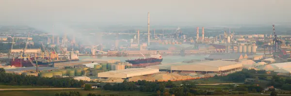 Drone shot of industrial and port area of Ravenna,production district is made up of a chemical and petrochemical pole, thermoelectric and metallurgical plants.