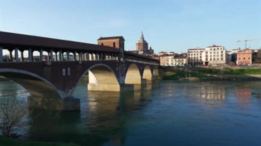 Pavia Panorama (İtalyanca: Panorama of Pavia, Ponte Koperto), İtalya 'nın Pavia Katedrali' nde güneşli bir günde Ticino nehri üzerinde yer alan köprü.