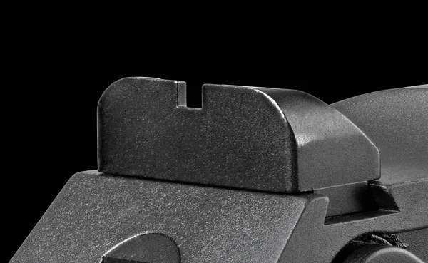 黒の背景にある拳銃のリアサイト — ストック写真