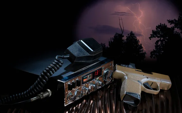 Lightning striking behind a ham radio and a gun