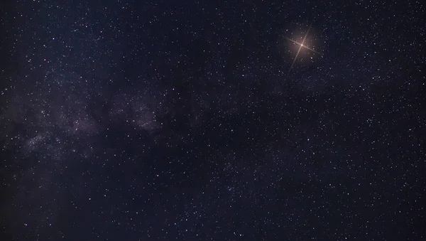 Christmas Star that is rising to the right of the Milky Way