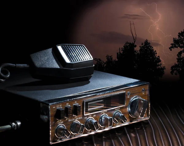 Lightning strike behind a two way radio and microphone