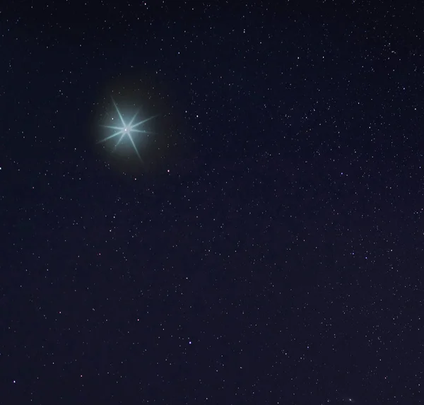 Christmas star rising late on Christmas Eve with copy space