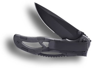 Blade partially open on a tactical folding knife with a pocket clip for carry and a shadow behind